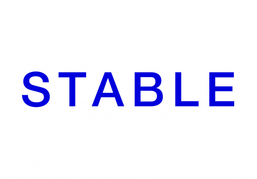 stable arts logo in blue