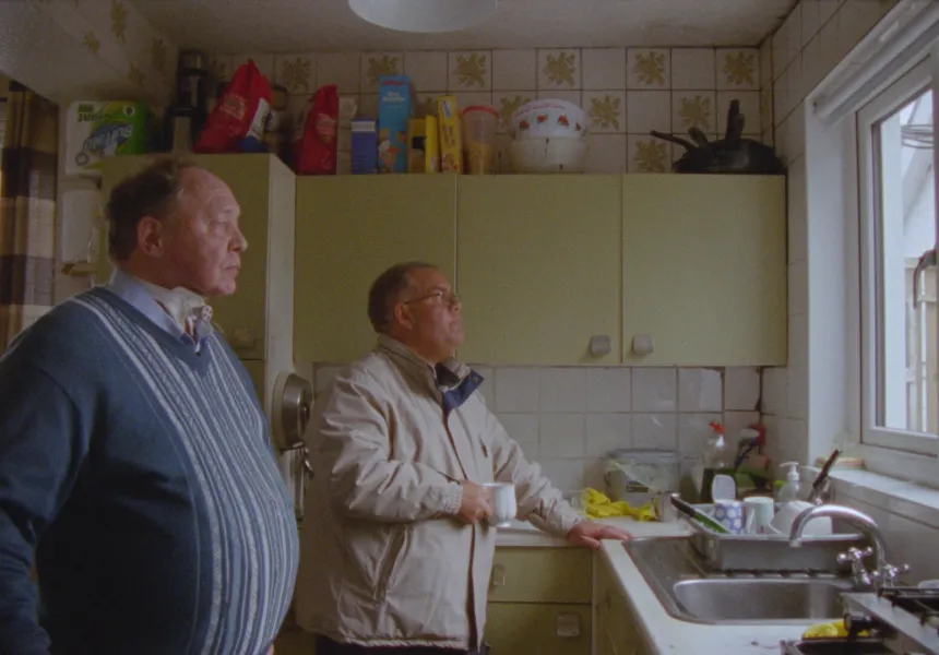 ECHO image, two men standing in kitchen